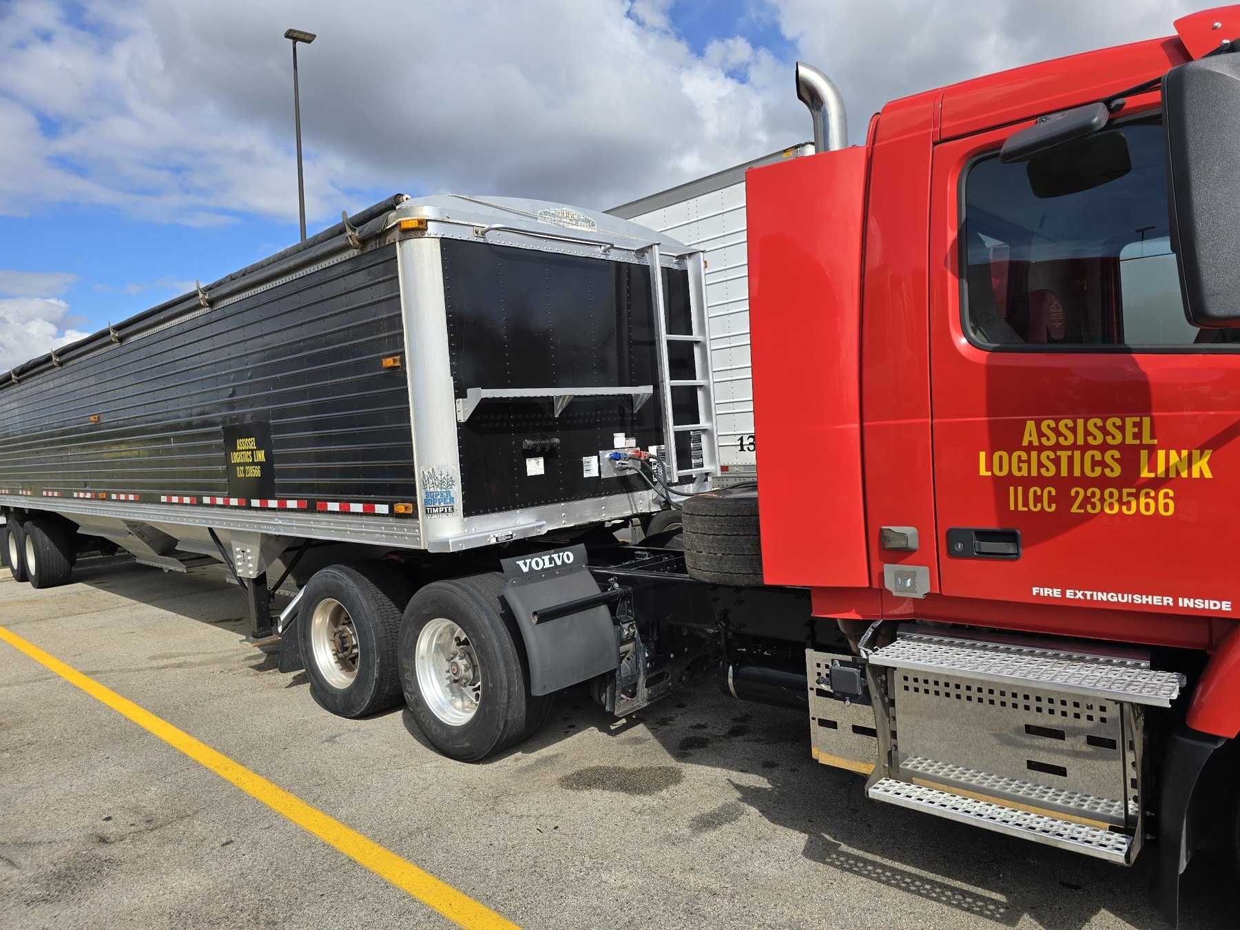 Red truck and grain trailer close-up