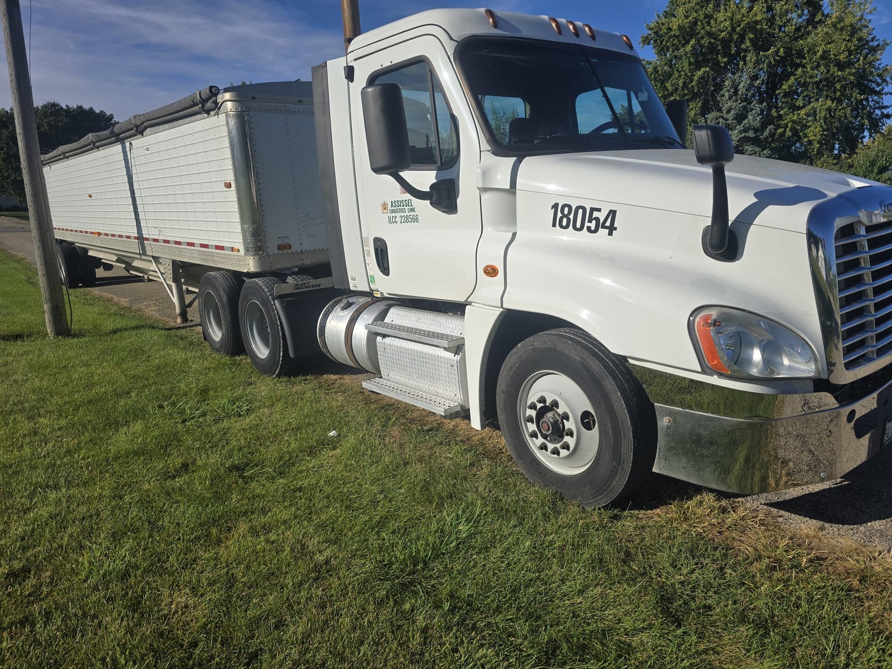 White grain hauling truck
